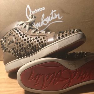 Christian louboutin spike sneakers red bottoms